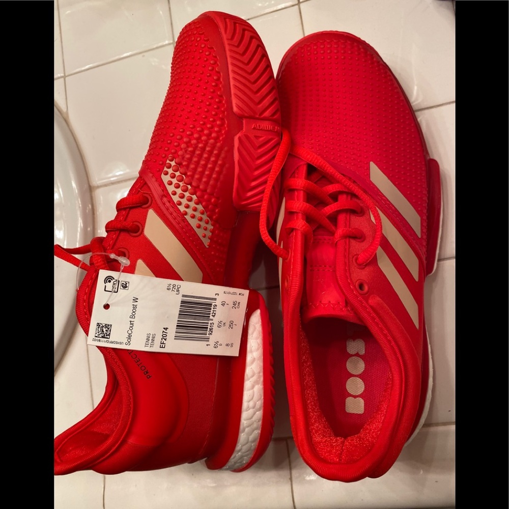 Women’s SoleCourt Boost tennis shoes
